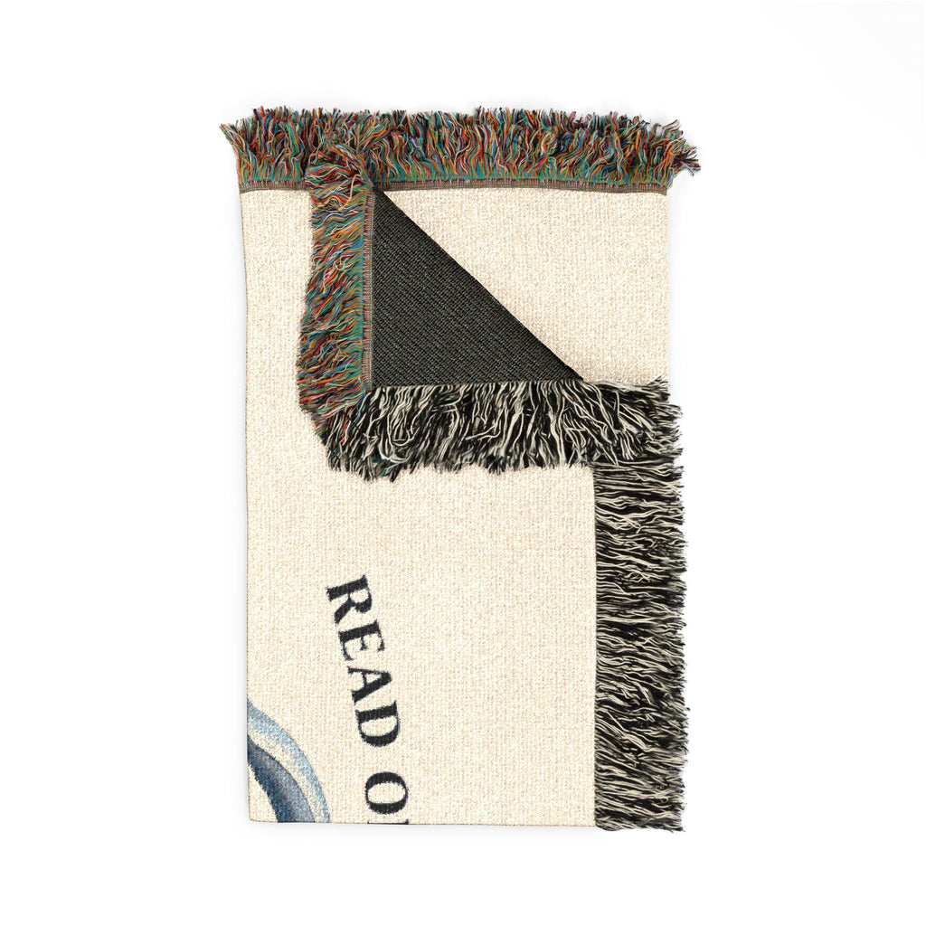 Woven cotton throw blanket with yarn and books design
