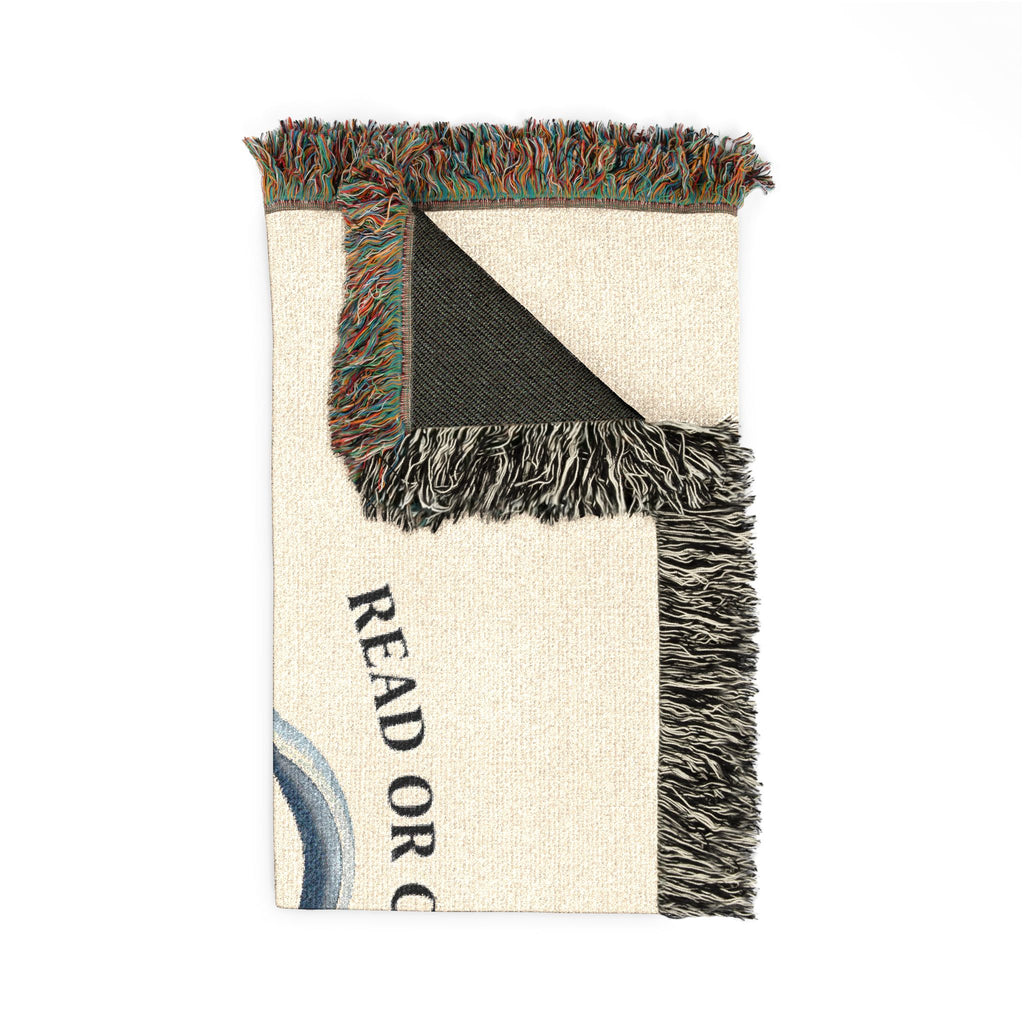 Woven cotton throw blanket with yarn and books design