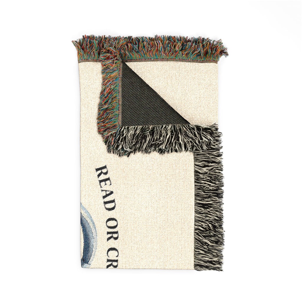 Woven cotton throw blanket with yarn and books design
